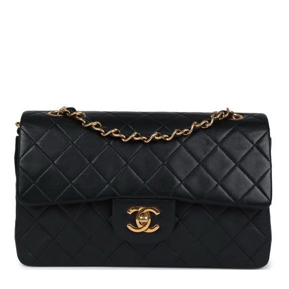 Vintage Chanel Small Classic
Double Flap Black Lambskin
Gold Hardware - Picture 1 of 7